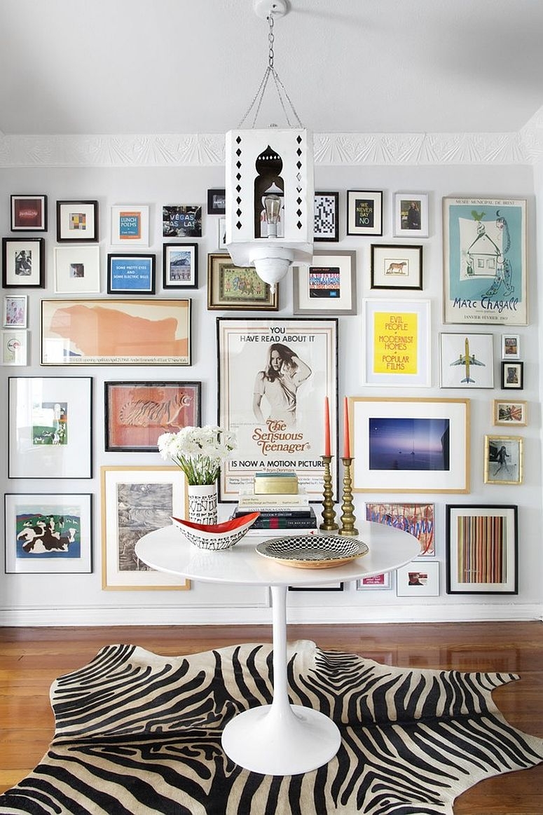 Pedestal Table Zebra Hide Rug and Maximalist Art Display