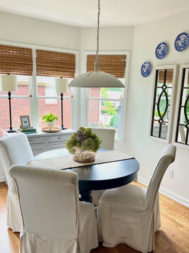Pendant Light: Slipcovered Chairs and Bamboo Shades decor