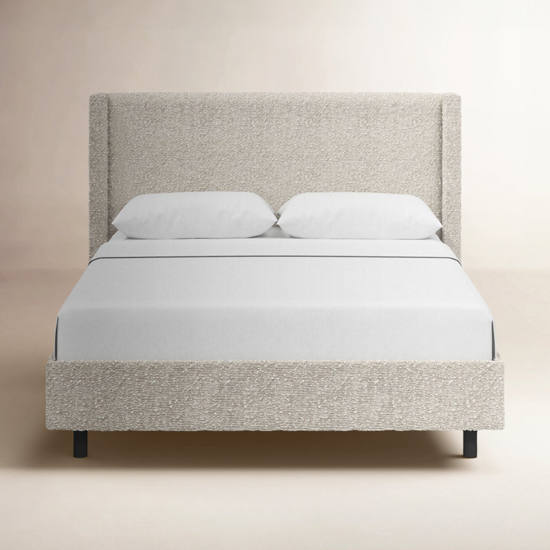 Platform Bed: Ivory Boucle Wingback with Slim Black Legs