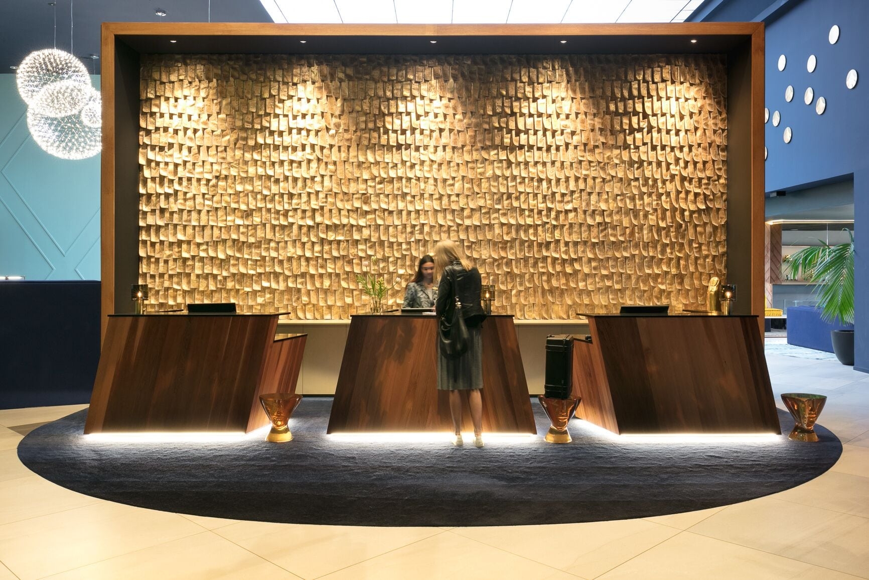 Reception Desk featuring Angular Silhouette and Under-Glow