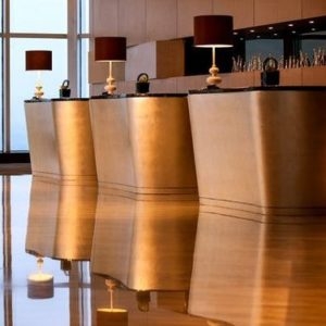 Reception Desk in Champagne Gold Curved Pod Style Luxury