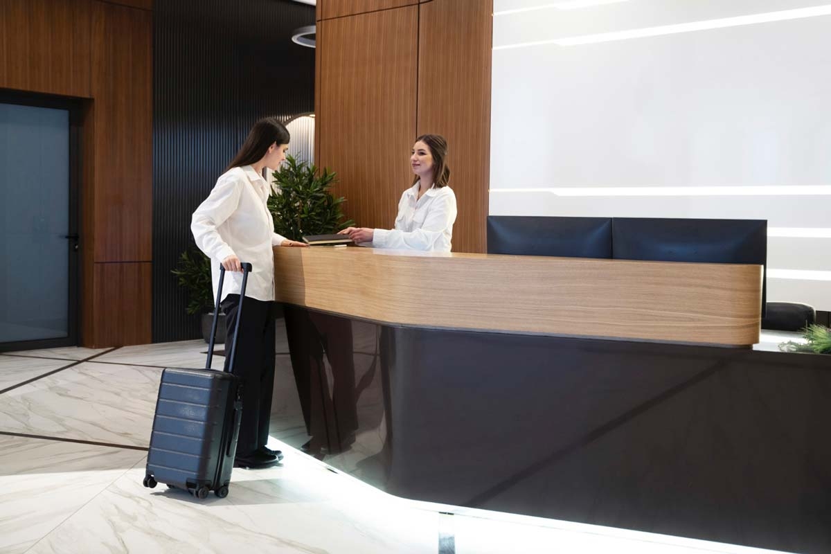 Reception Desk using Backlit Base and Diagonal Floor Inlay