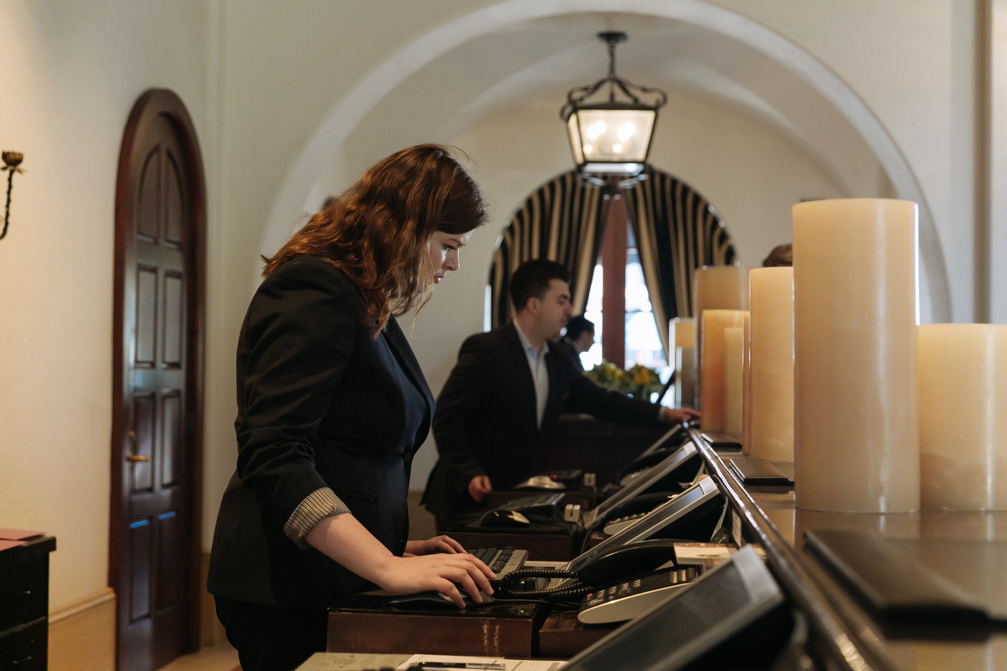 Reception Desk with Oversized Pillar Candles Luxury Decor