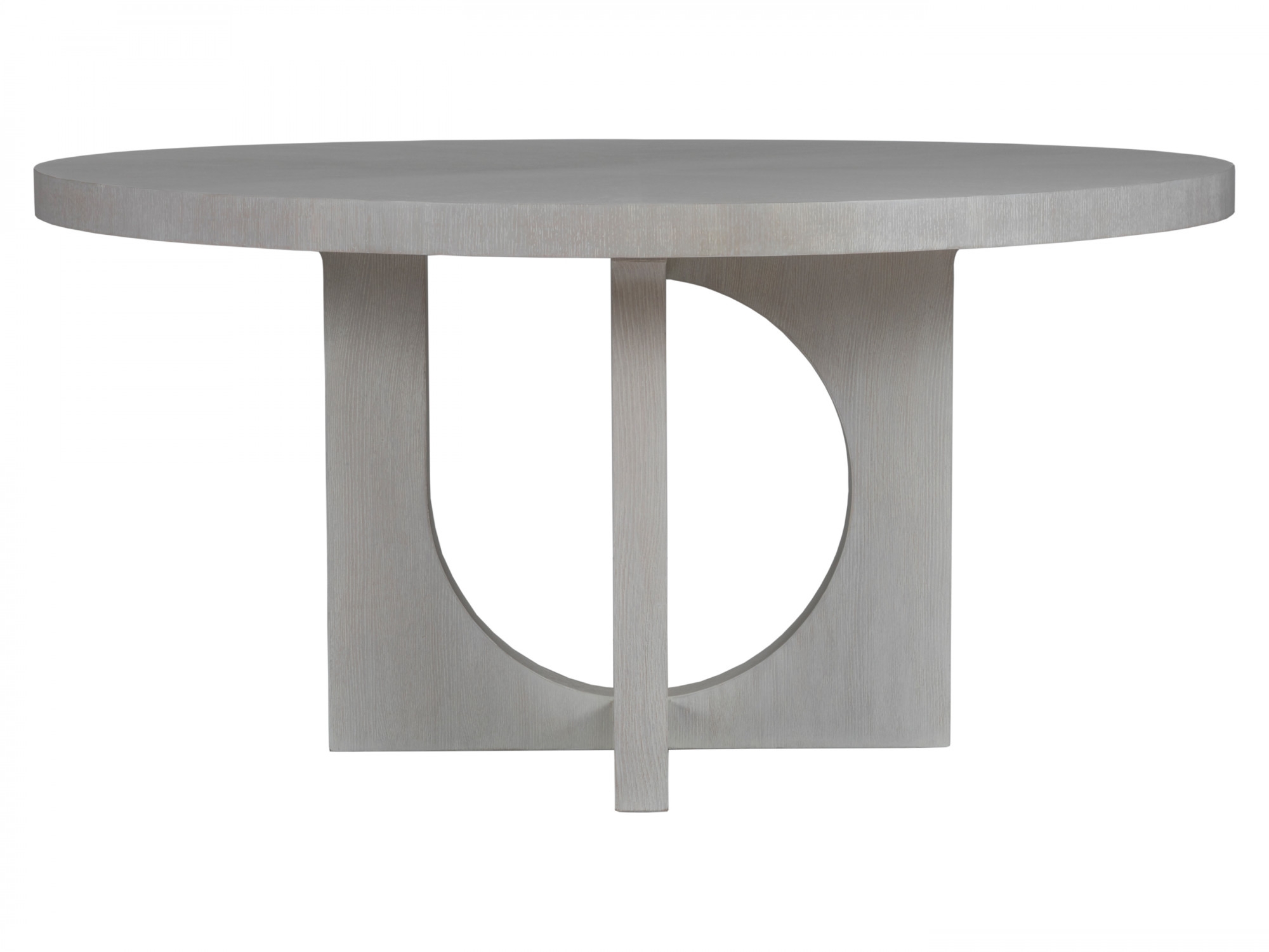 Round Dining Table highlights Apostrophe Base Sculptural