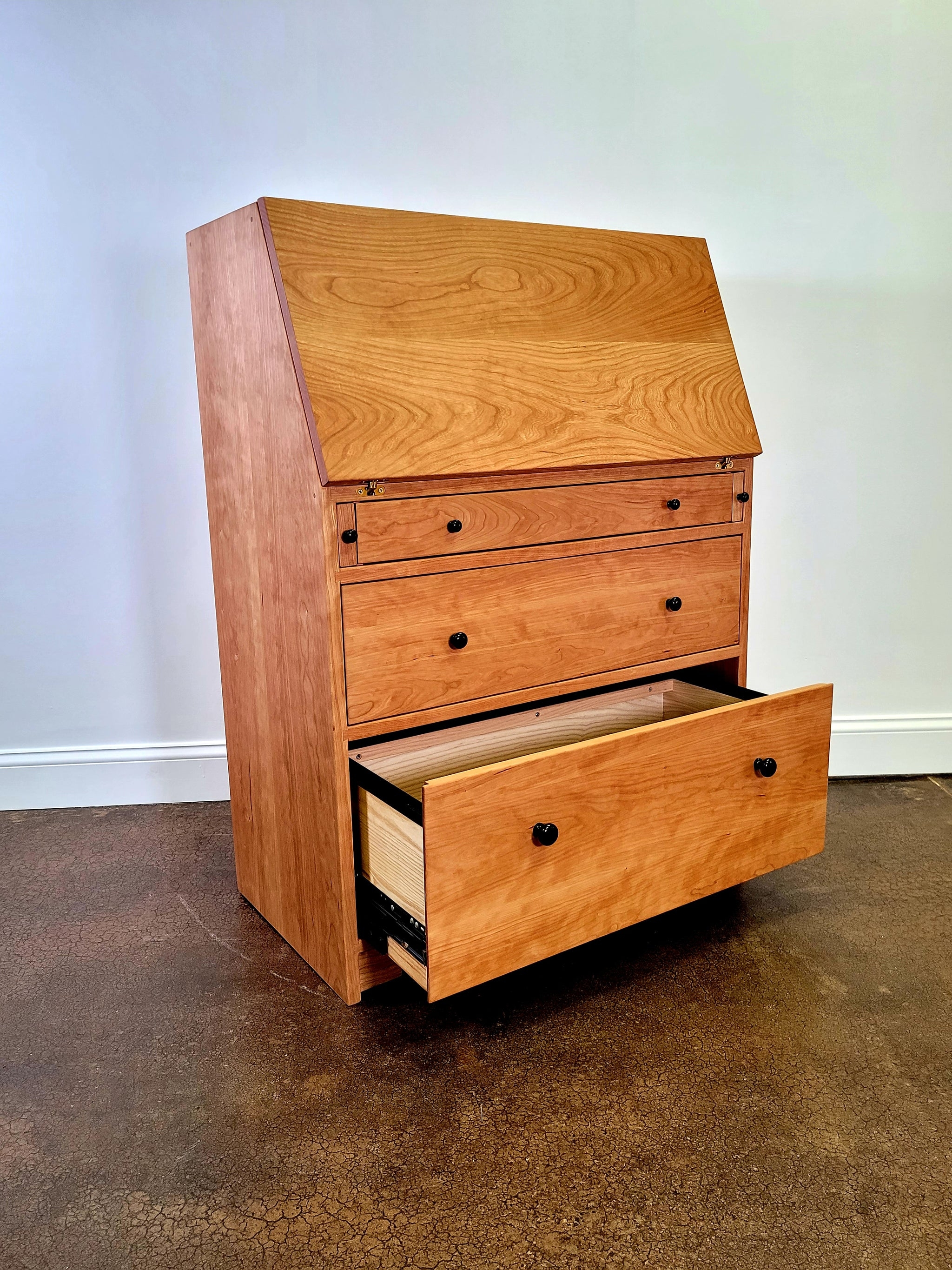 Secretary Desk: Slanted Drop Front Amber Wood Writing Desk