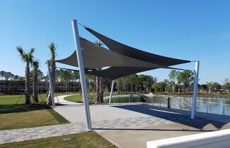Shade Sail: Overlapping Sails with Angled Metal Shade Poles Style