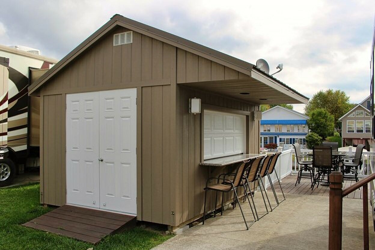 Shed Bar with Integrated Overhang and Metal Seating