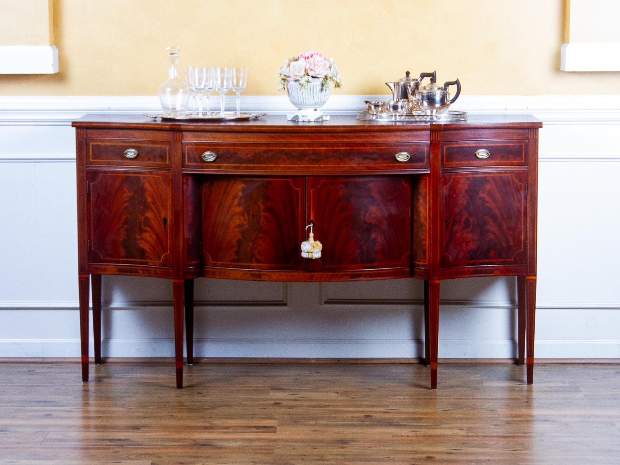 Sideboard Featuring Serpentine Silhouette And Tapered Legs