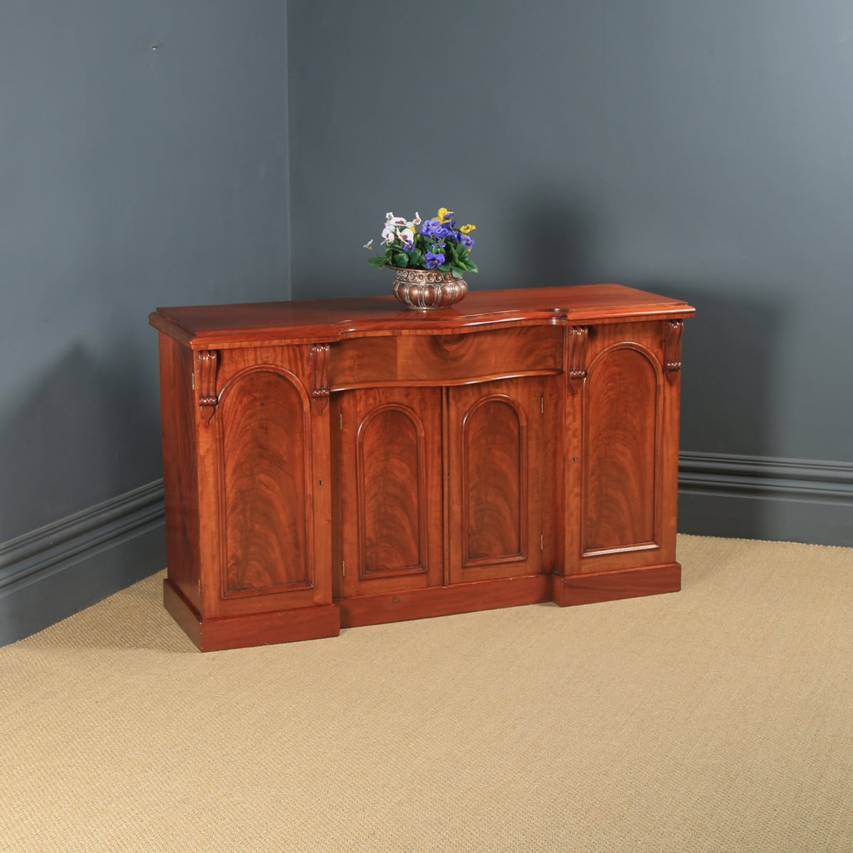 Sideboard Featuring Serpentine Top And Arched Door Panels