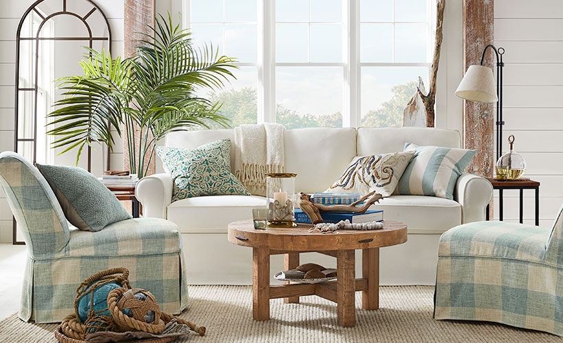 Slipcovered Sofa with Skirted Base and Plaid Accent Chairs