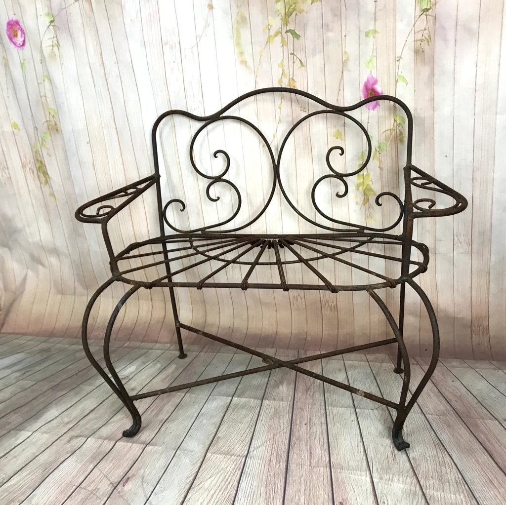 Small Bench featuring Radial Slat Seat and Iron Bench