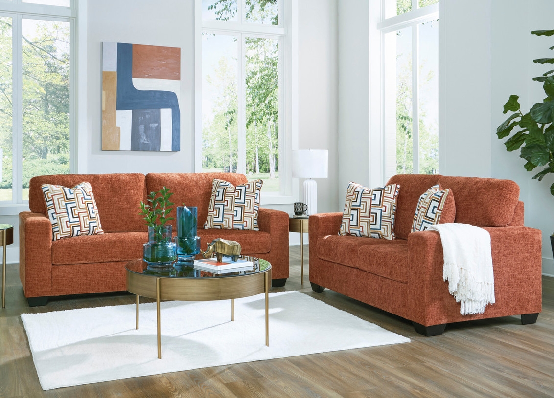 Sofa Set with Spice Orange Fabric and Geometric Pillows