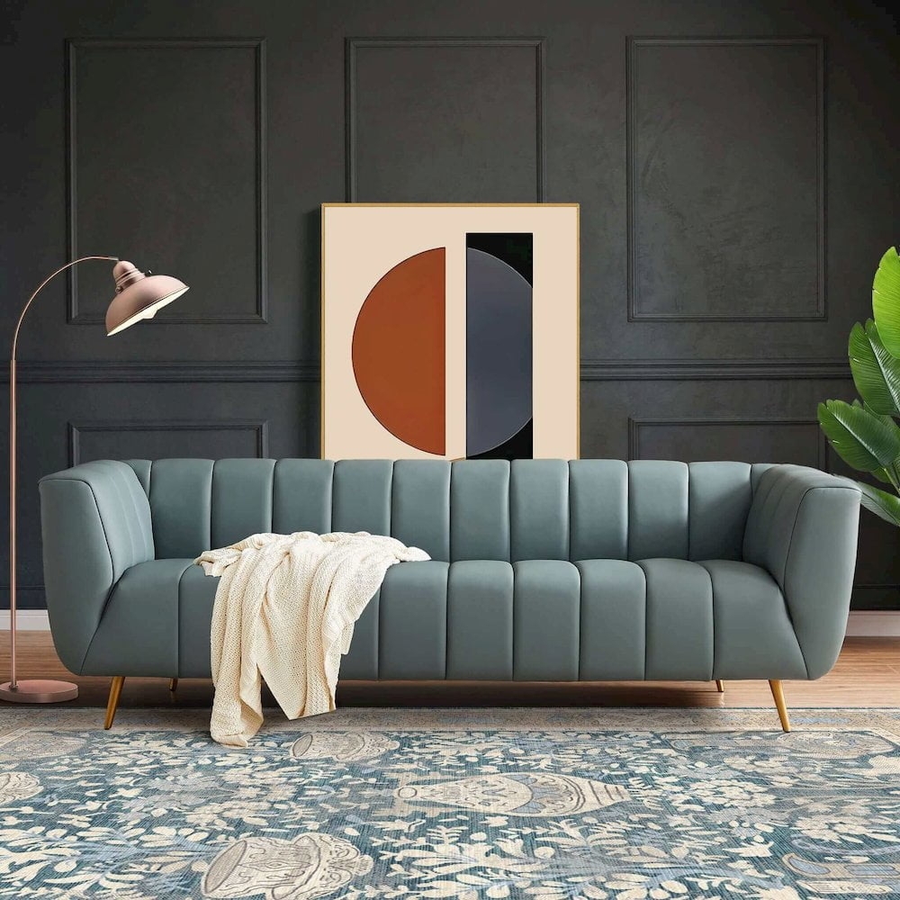 Sofa: Vertical Channel Tufting and Gold Tapered Legs