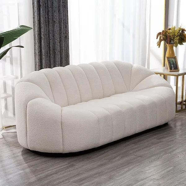 Sofa with Channeled Back and Oval Base in Cream Fabric