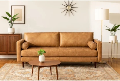 Sofa with Reversible Back and Starburst Clock Pairing