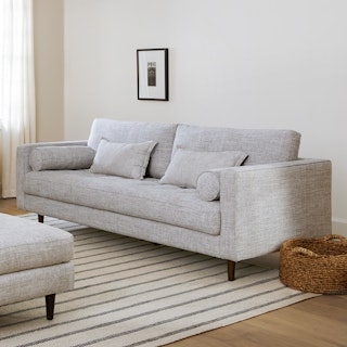Sofa with Round Bolster Pillows and Modern Stone Gray Fabric