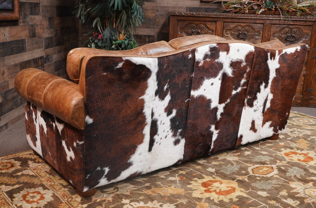Sofa with Scalloped Backrest and Tricolor Hide Pattern