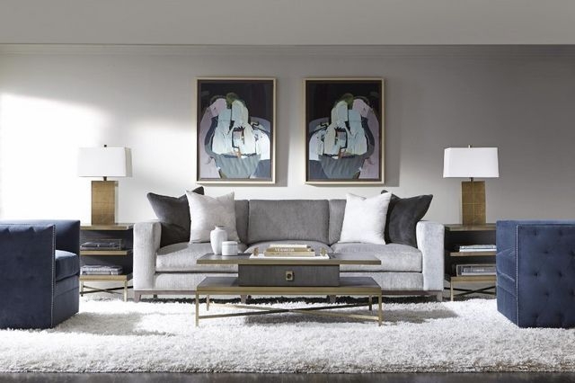 Sofa with Tufted Blue Chairs and Contemporary Art Pairing