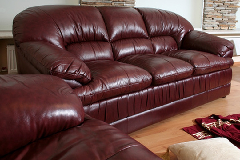 Sofa with Vertical Pleating and Oxblood Living Room Decor