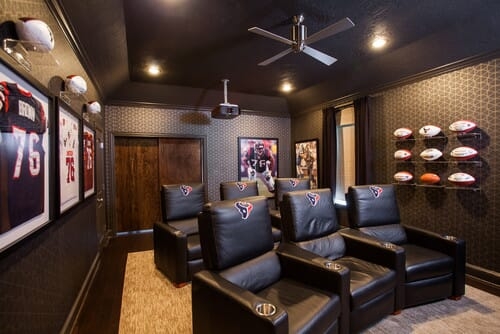 Theater Seating: Tiered Seating Layout and Geometric Wallpaper