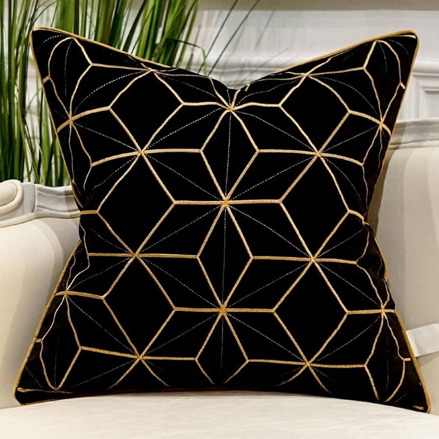 Throw Pillow featuring Interlocking Gold Lines and Cord