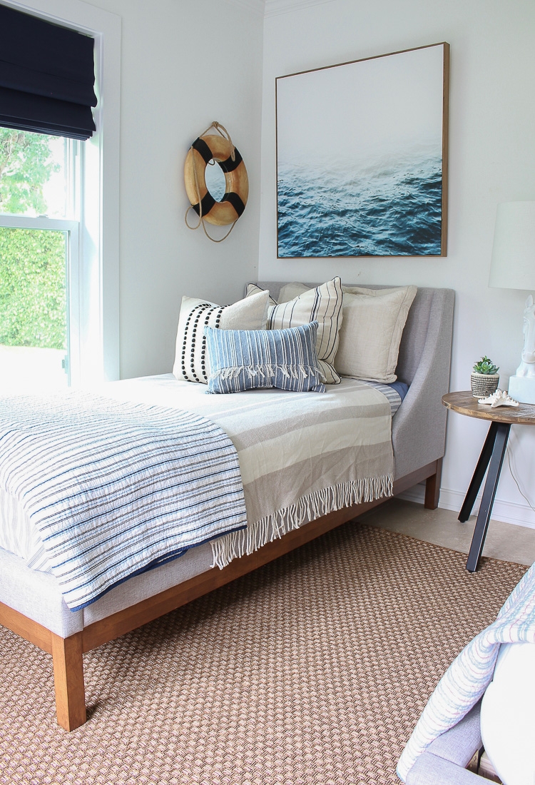 Twin Bed with Winged Headboard and Nautical Wall Art Gallery