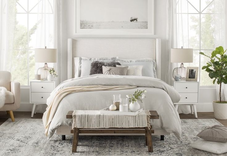 Upholstered Bed: Tapered Legs and Layered Textiles in Cream