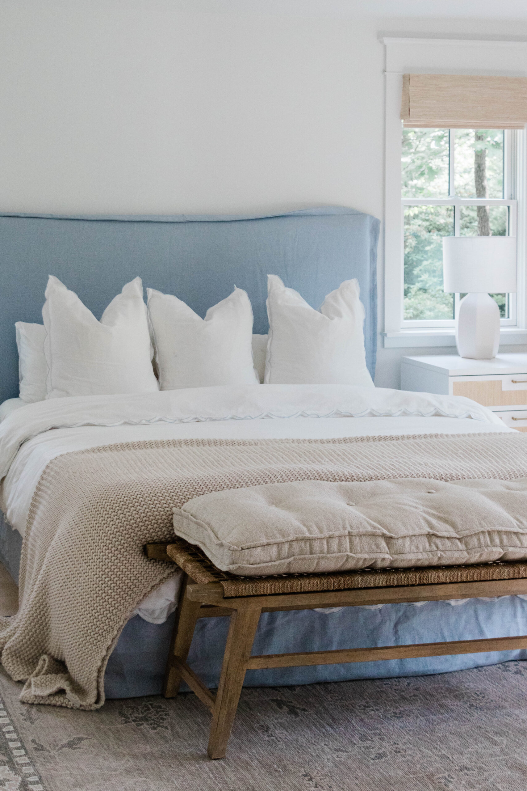 Upholstered Bed with Dusty Blue Fabric and Cane Bench