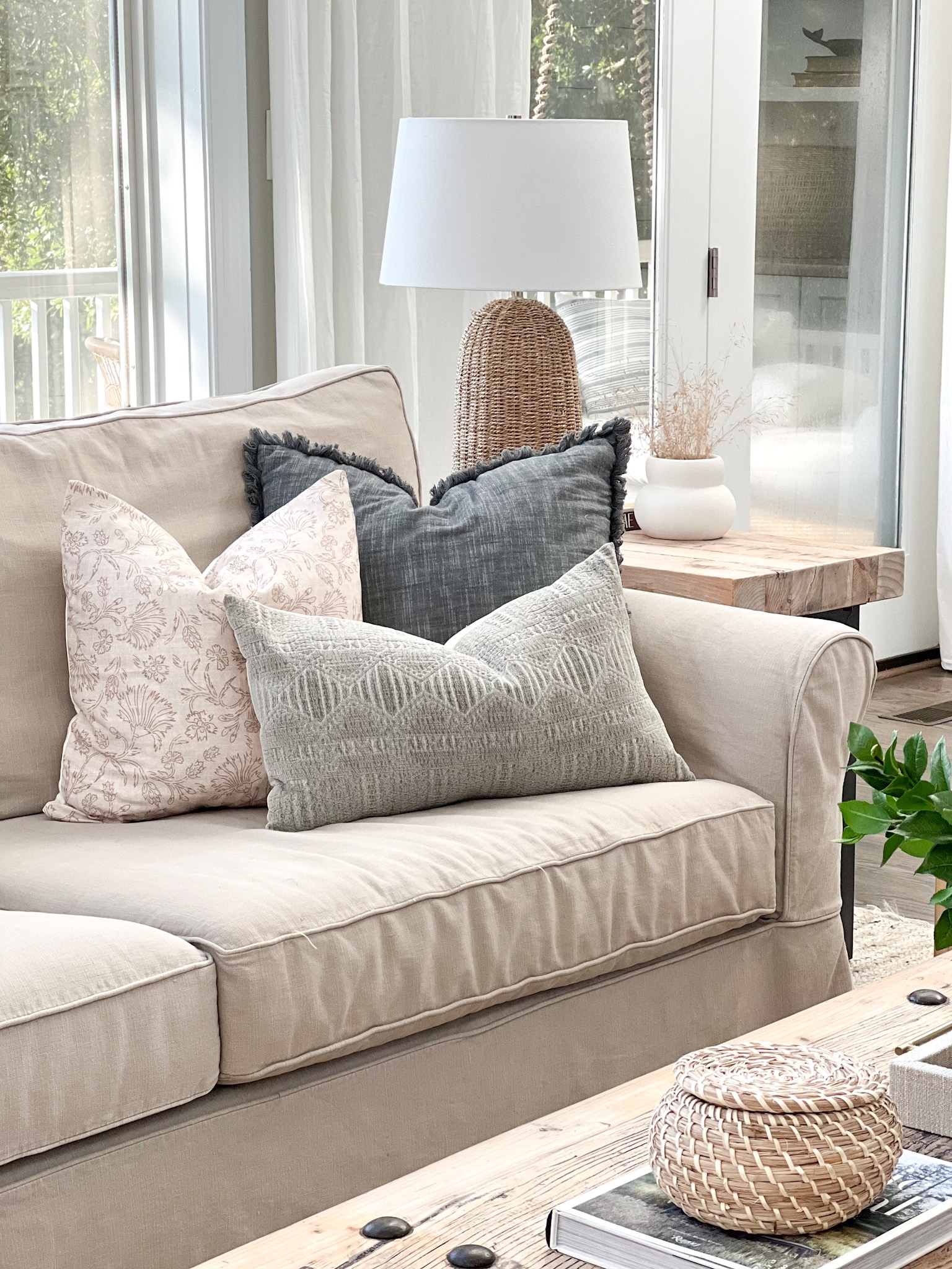 Upholstered Sofa with Fringed Trim Textured Lumbar Pillow Styling