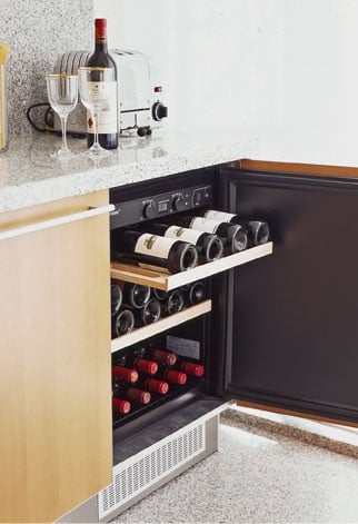 Wine Refrigerator with Pull Out Shelves and Home Bar Cabinetry