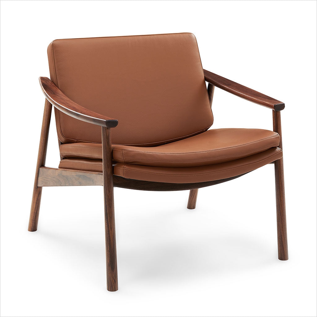 Accent Chair featuring Curved Armrests and a Layered Seat