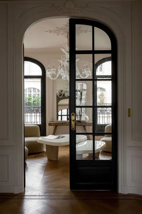 Arched French Door: Dark Metal Frame Parisian Design