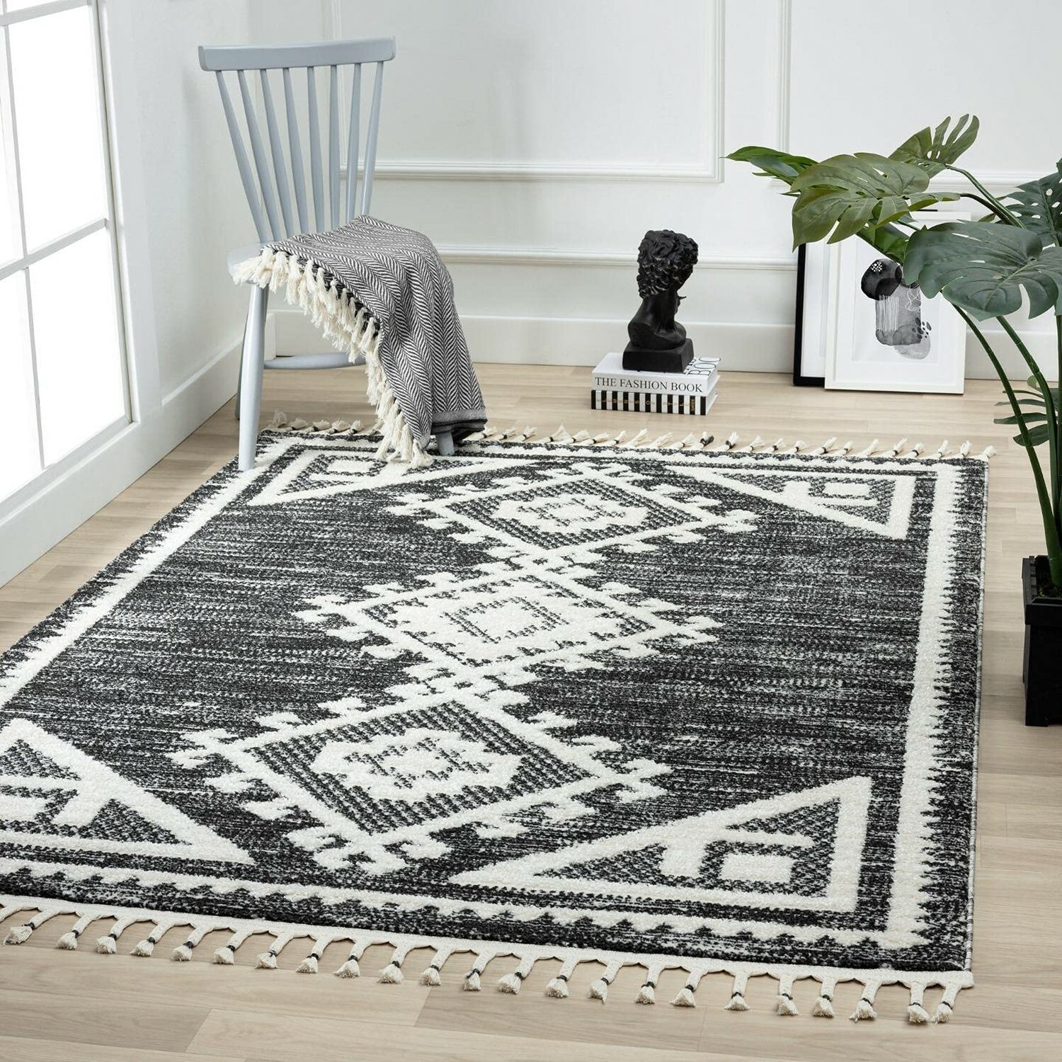 Area Rug: Geometric Diamond Pattern and Charcoal Braided Tassels