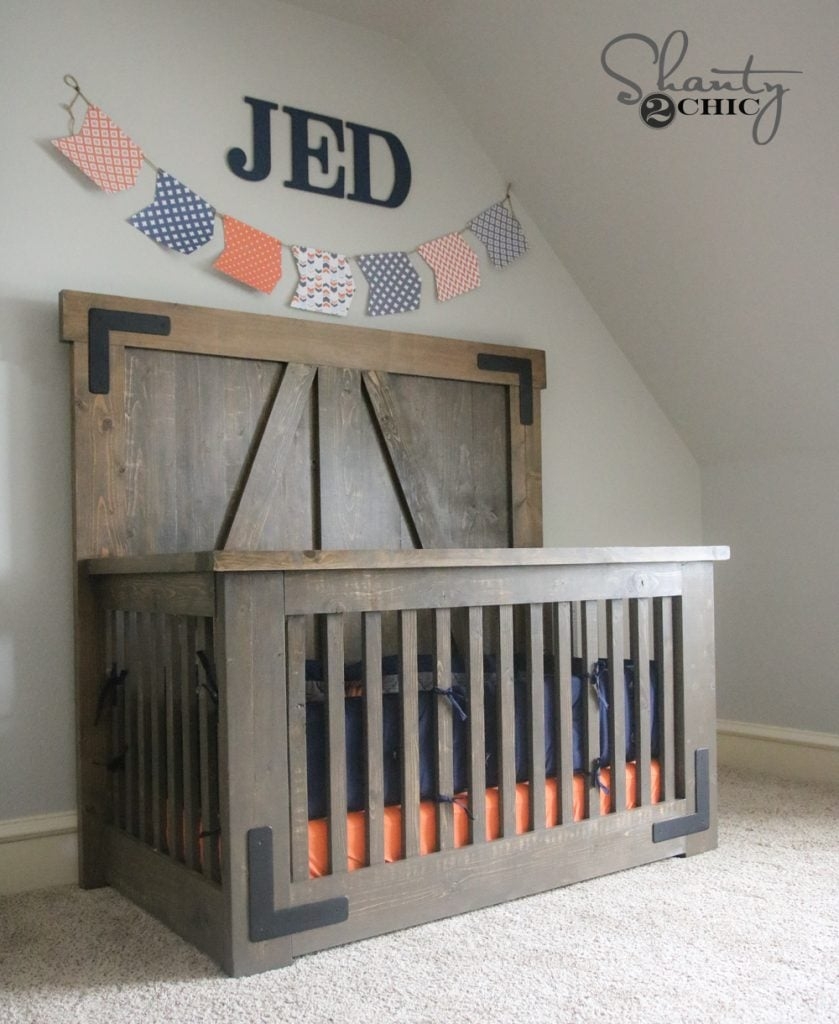Baby Crib with Barn Door Headboard and Industrial L-Bracket Detail