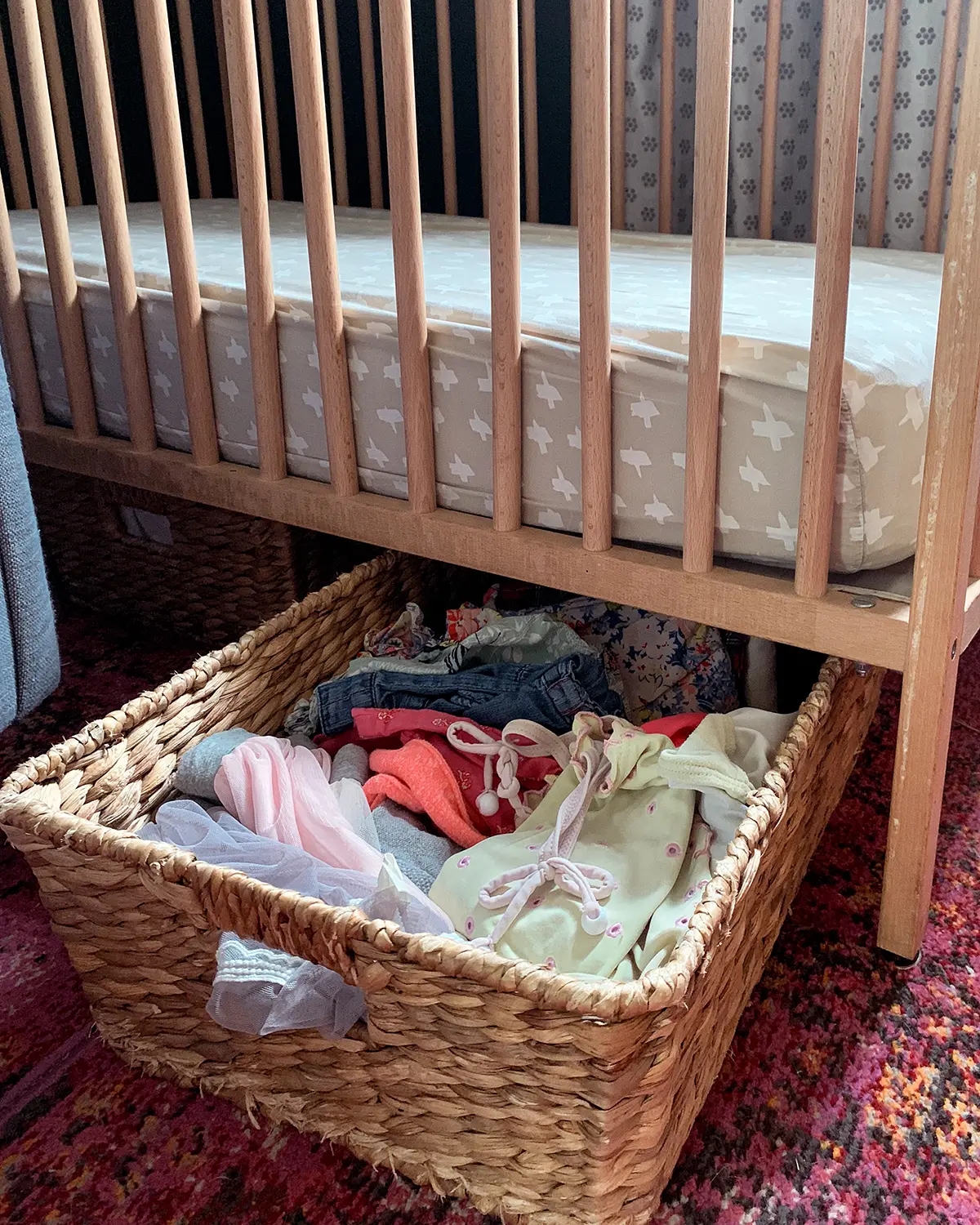 Baby Crib with Woven Basket Storage and Natural Wood Frame