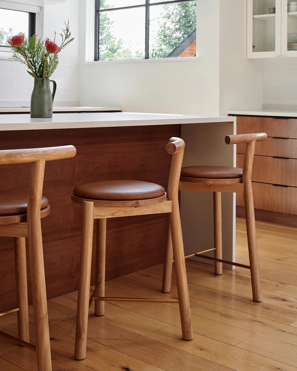 Bar Stool featuring Curved Backrest and Cognac Leather