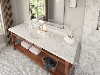 Bathroom Vanity with Gold Hardware and Veined Quartz Surface