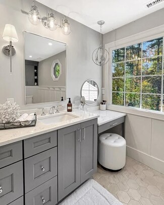 Bathroom Vanity with Hexagon Floor Tile and Orb Pendant