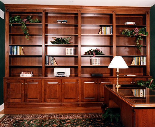 Built-In Bookcase: Walnut Wall with Fluted Pilasters
