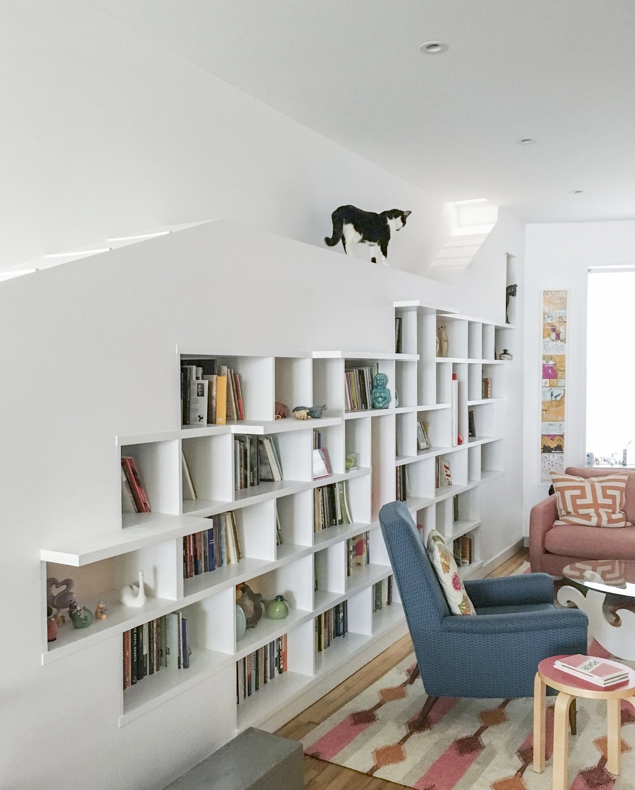 Built In Bookcase with Integrated Catwalk Transit