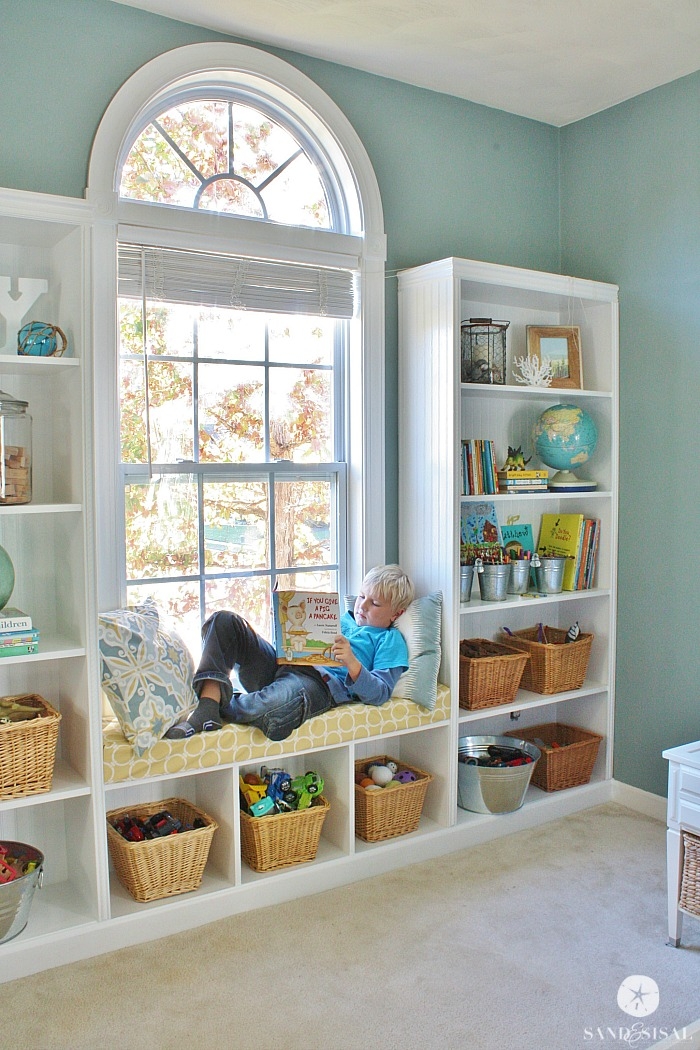 Built-In Window Seat Arched Window Coastal Kids Room Shelving