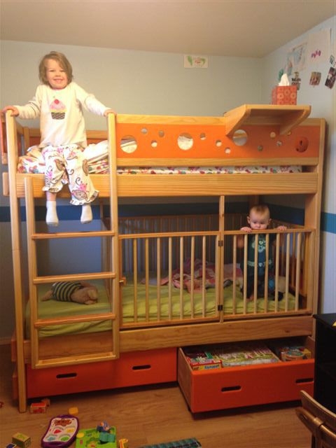 Bunk Bed Crib Combo: Orange Accent Panels and Storage Drawers