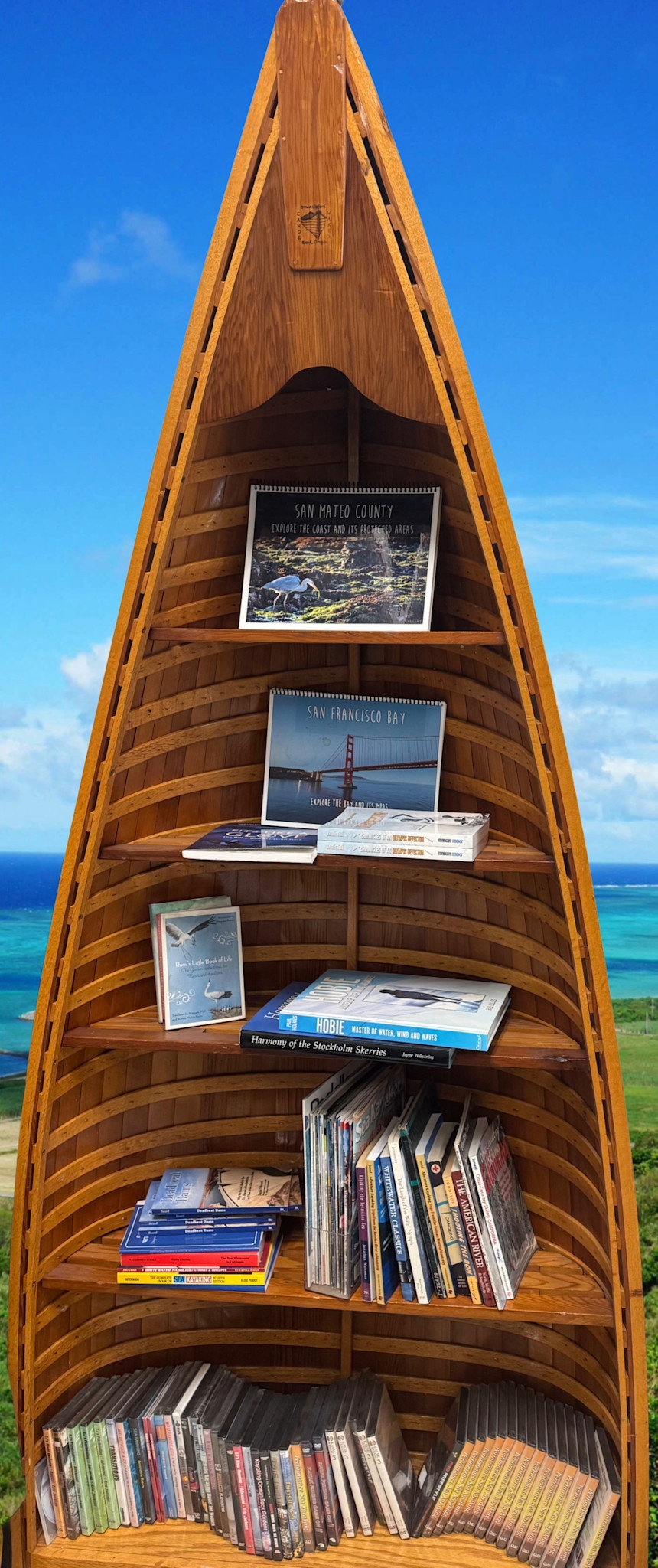 Canoe Bookcase with Internal Ribs and Wood Strip Construction