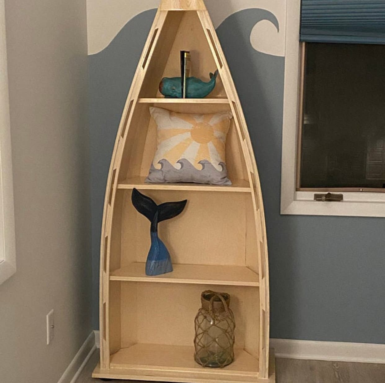 Canoe Bookshelf featuring Side Ribbing and Tapered Top