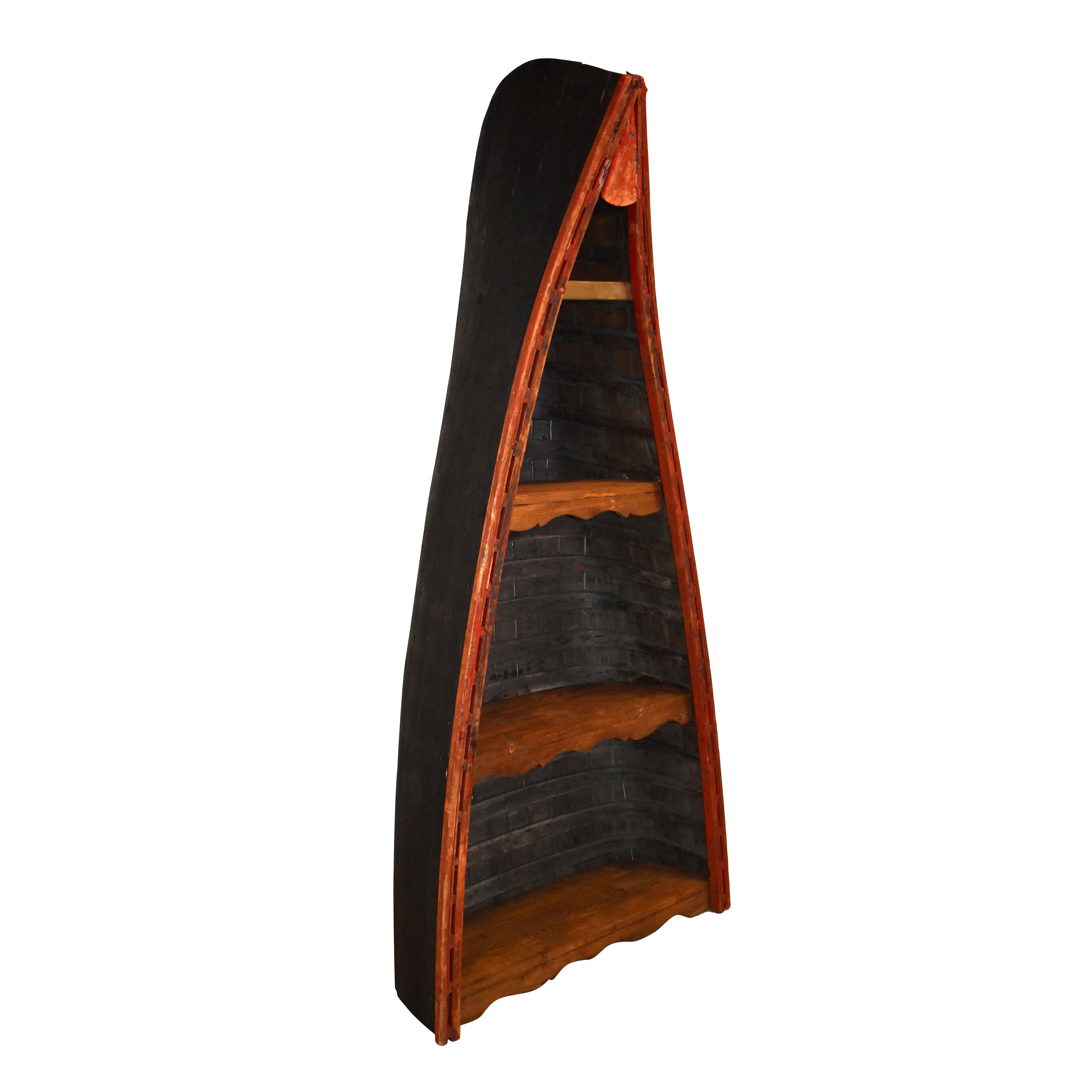 Canoe Bookshelf includes Scalloped Shelf Edges and Vertical Storage