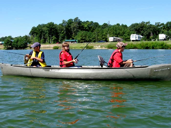 Canoe with Three Occupant Capacity and Adventure 16 Design