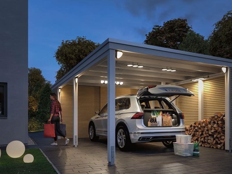 Carport Lighting with Integrated Spots and Glowing Garden Globes