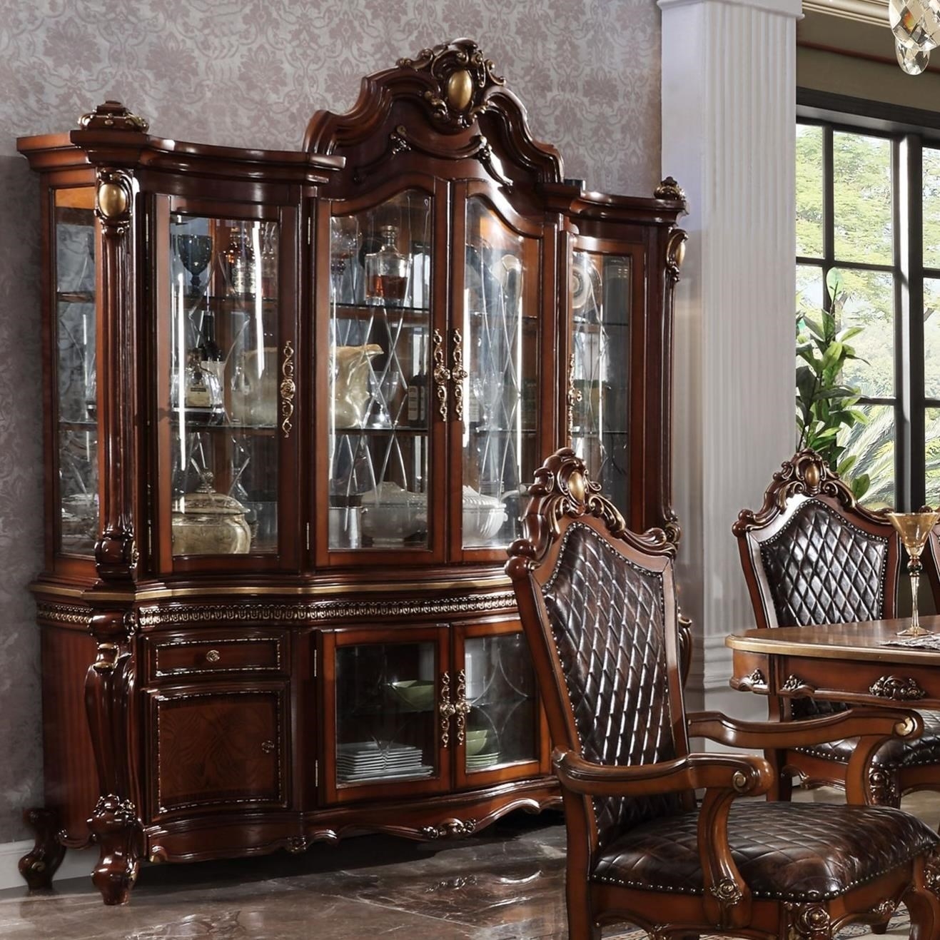 China Cabinet with Gold Accents and Carved Pediment