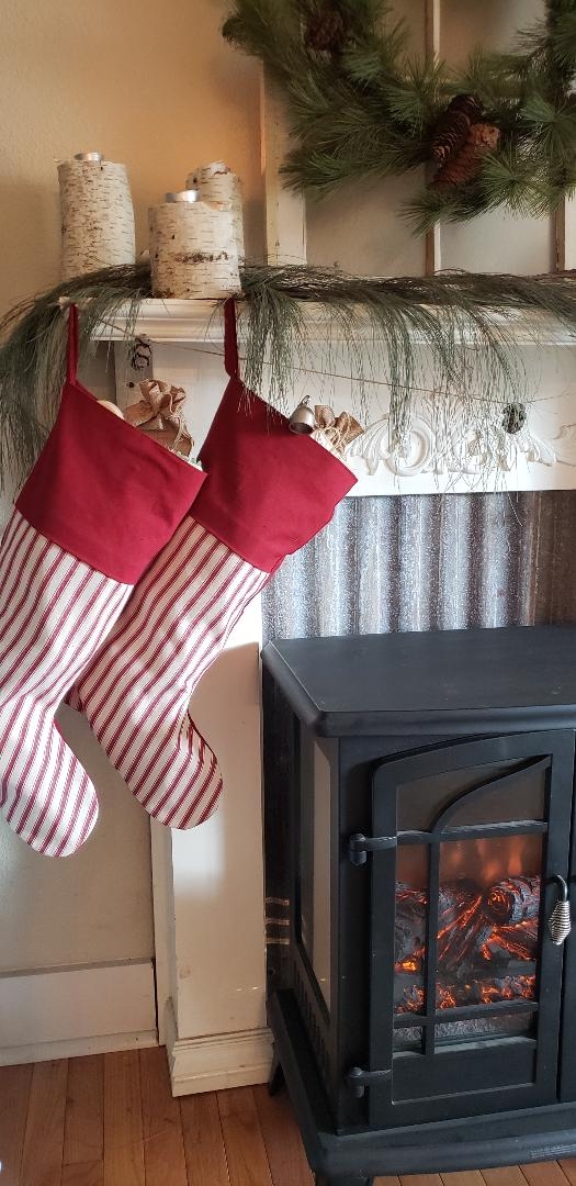 Christmas Stockings: Corrugated Metal Backdrop and Birch Logs