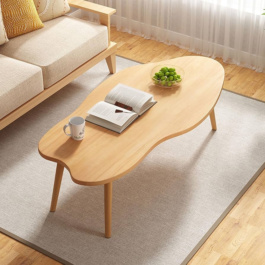 Coffee Table: Light Wood Tone Cloud Shape and Tapered Leg Base